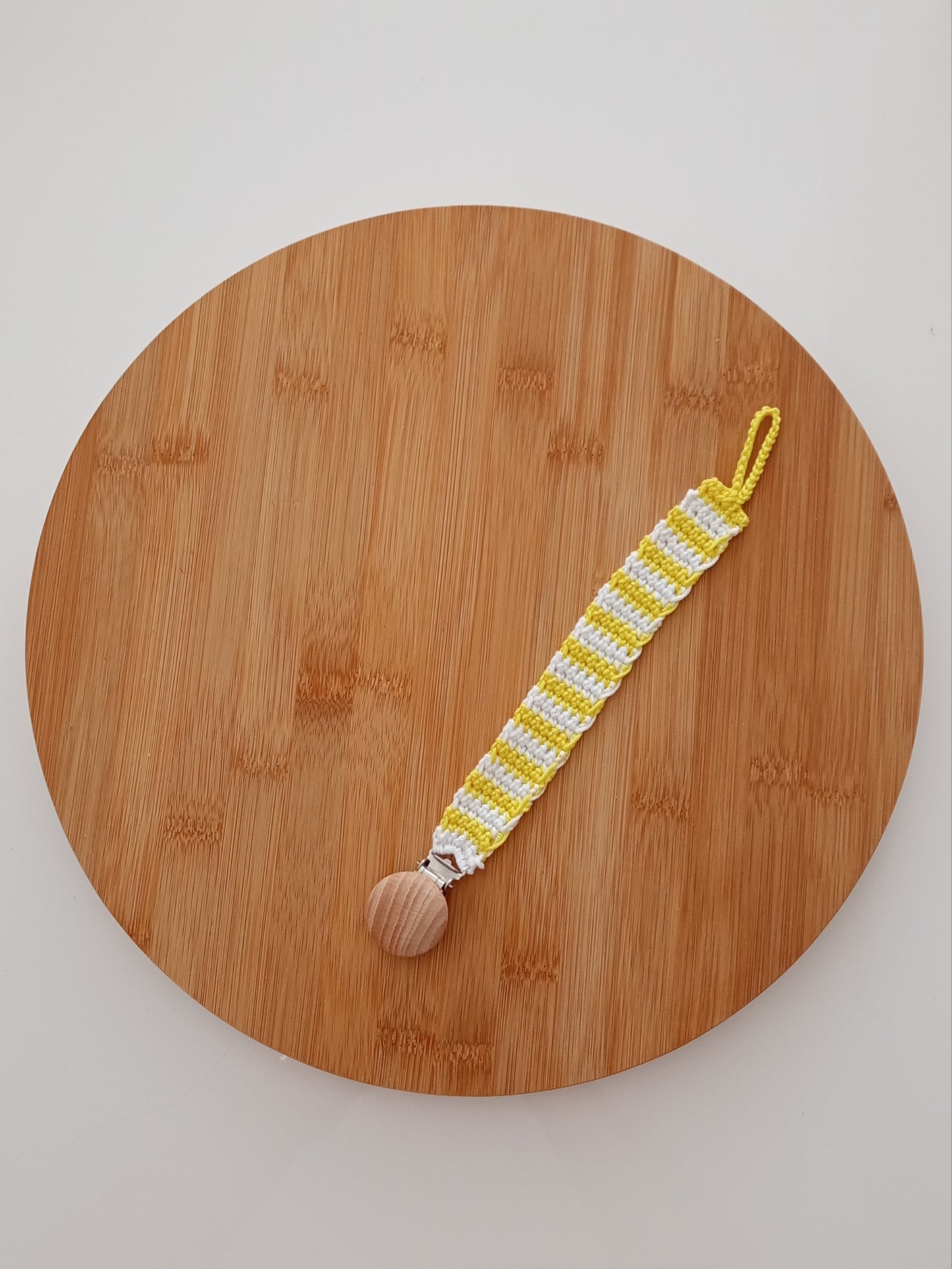 prendedor de chupeta (amarelo + branco)